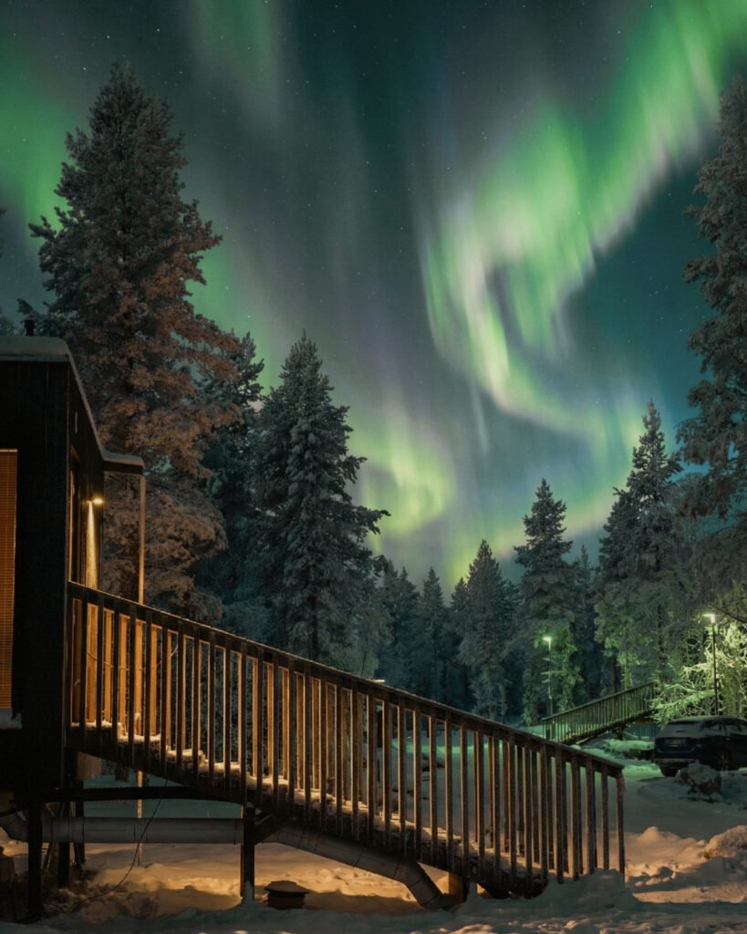 Northern lights above NOA Villas in winter