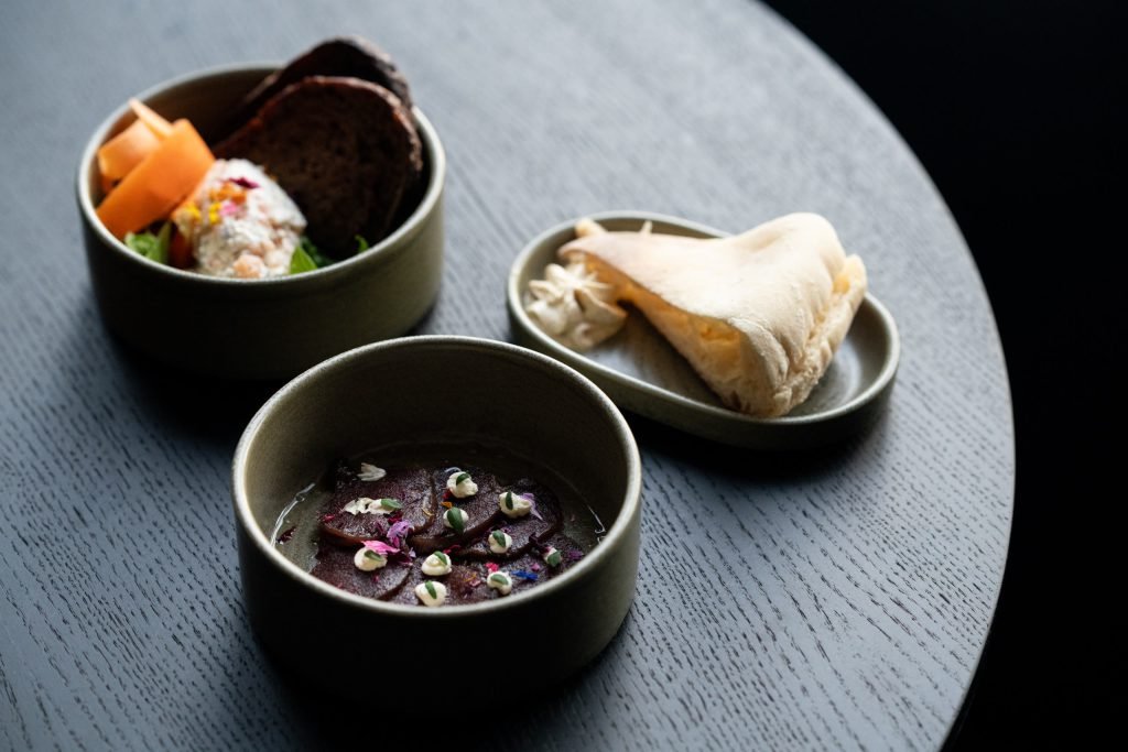 Nordic dishes served in ceramic bowls at NOA Villas.